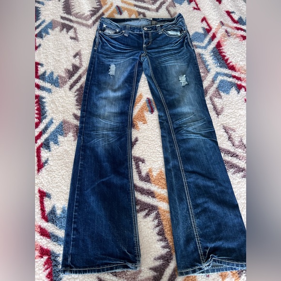 ZCO Denim - ZCO bootcut distressed jeans with design on back pockets.